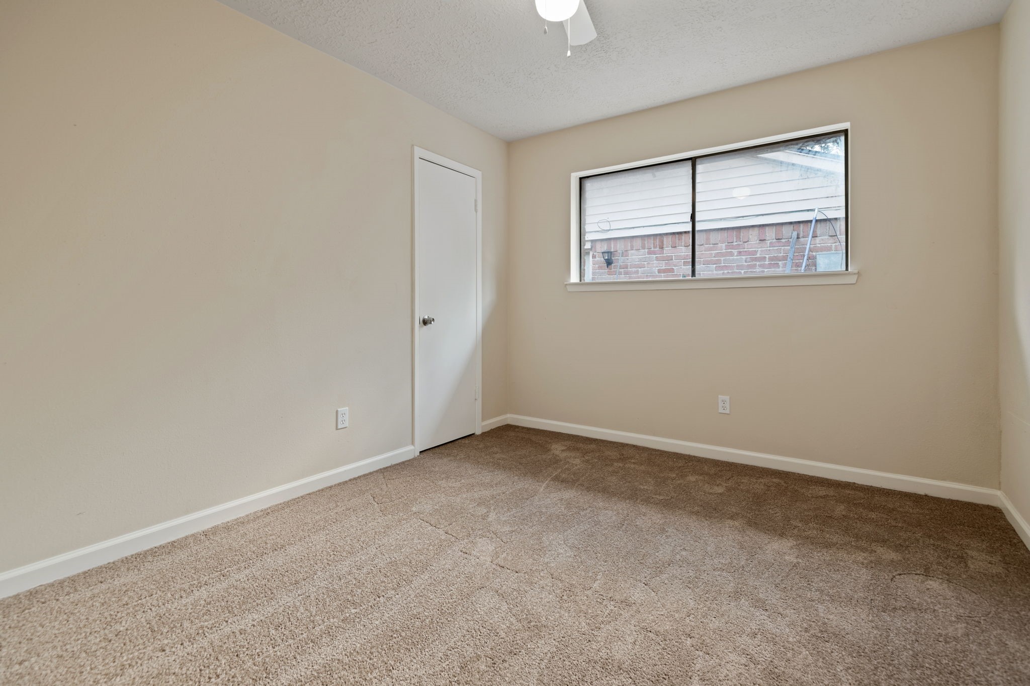 13315 Cologne Drive Houston, TX 77065 - Photo 8 of 15 an empty room with windows