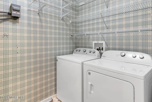 a view of a livingroom with a kitchen