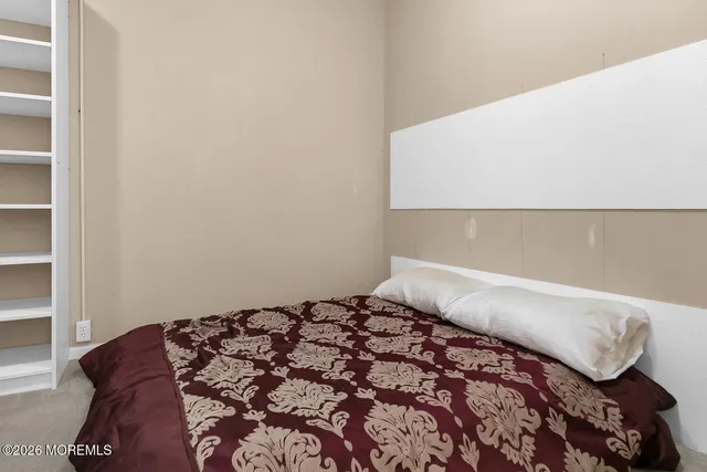 a bedroom with a bed