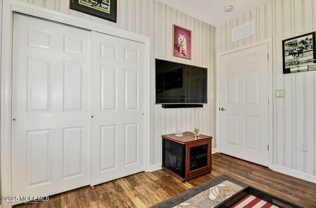 a bathroom with a glass shower door
