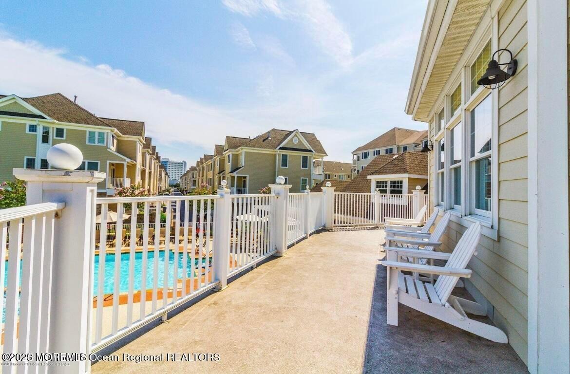 22 Cooper Avenue, Unit 110 Long Branch, NJ 07740 - Photo 29 of 64 Pool balcony