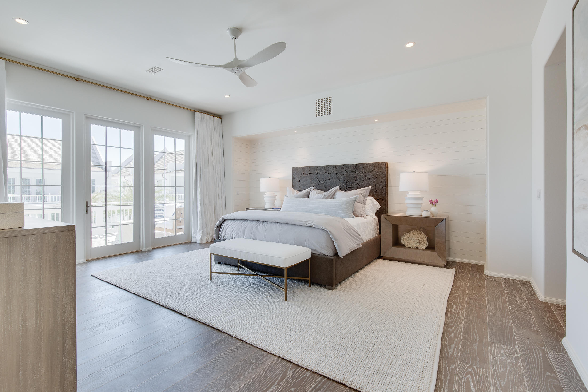 19 Astra Way Inlet Beach, Unit M12 Inlet Beach, FL 32461 - Photo 11 of 34 a bedroom with a large bed and a large window