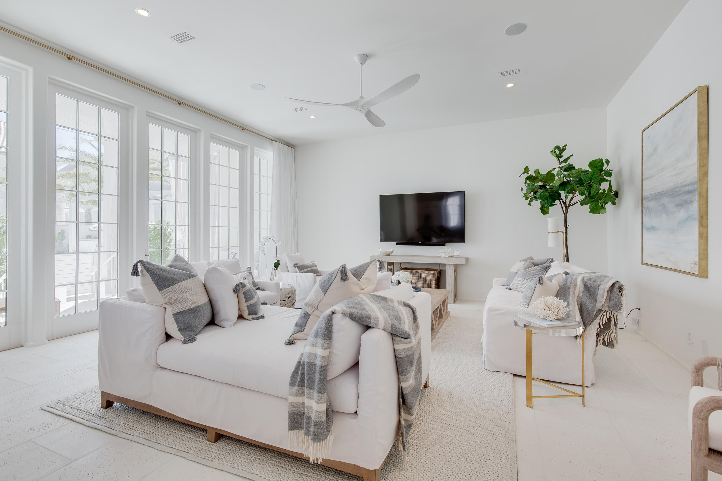 19 Astra Way Inlet Beach, Unit M12 Inlet Beach, FL 32461 - Photo 2 of 34 a living room with furniture and a flat screen tv