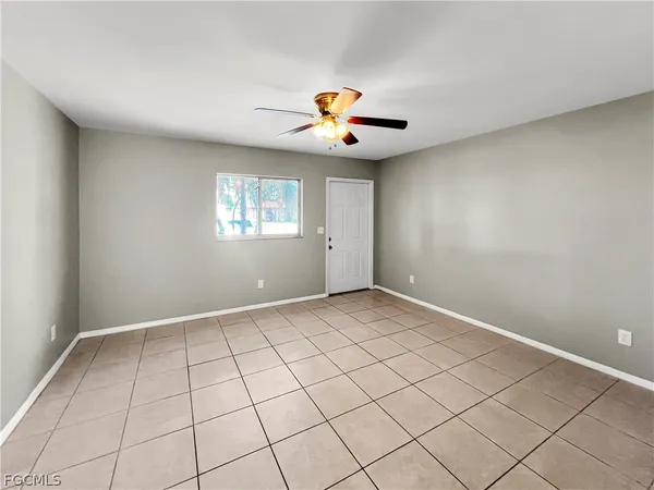a view of an empty room and window