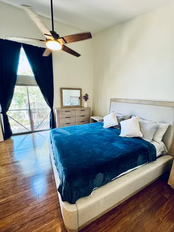 a bathroom with a shower and toilet