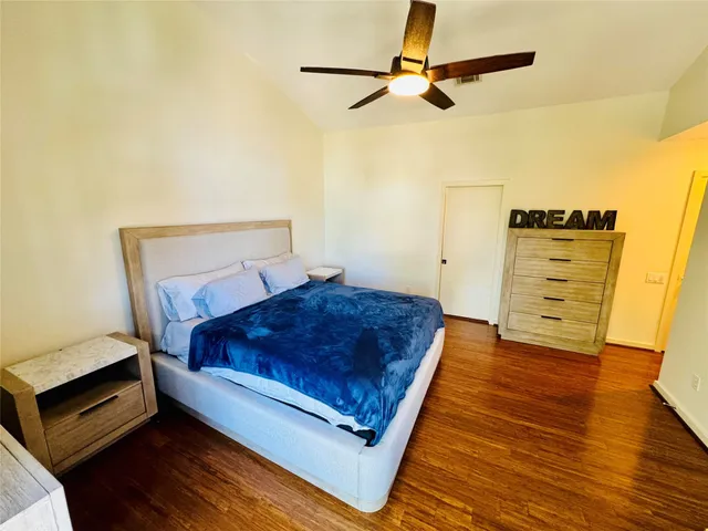 a bathroom with a shower and a toilet