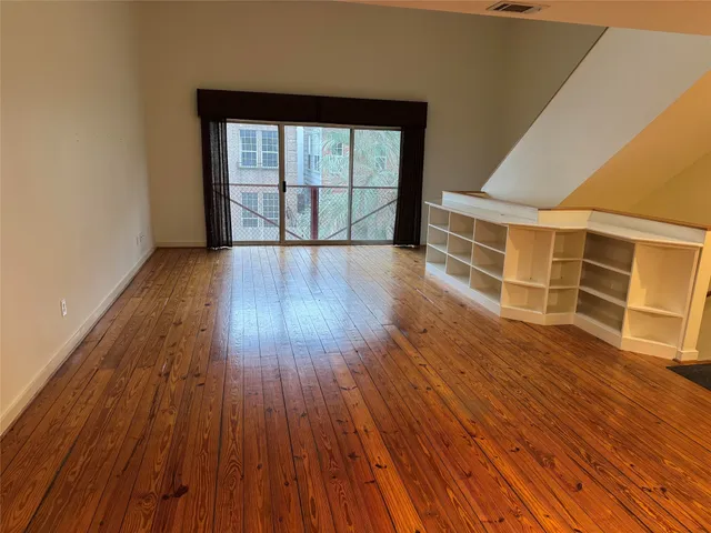 a kitchen with stainless steel appliances a stove and a refrigerator