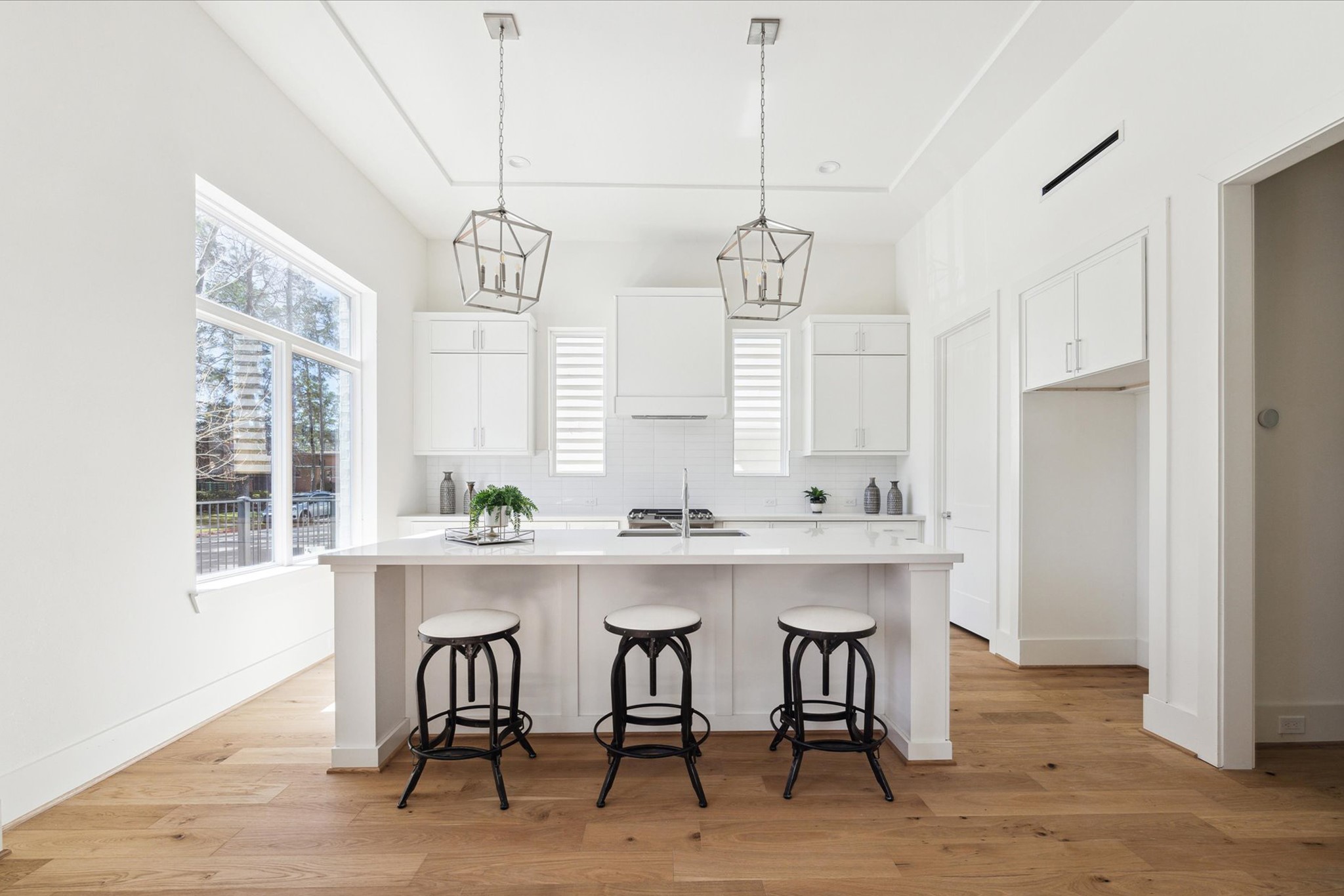 5309 Lambeth Riverside Drive Houston, TX 77091 - Photo 1 of 29 a kitchen with a table and chairs in it