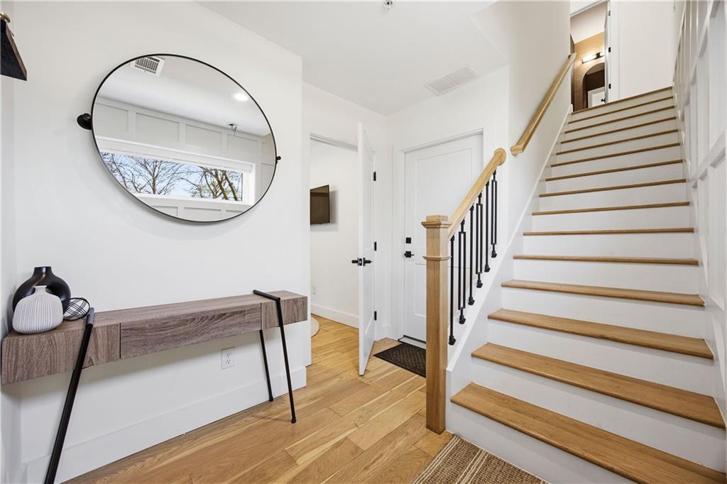 Undisclosed Address Atlanta, GA 30313 - Photo 3 of 38 a view of staircase with wooden door