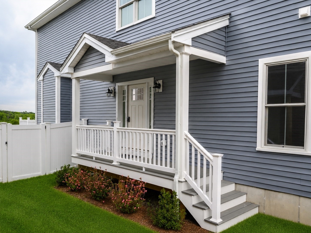 78 Metacomet Road, Unit 78 West Bridgewater, MA 02379 - Photo 3 of 39 a view of a house with a yard