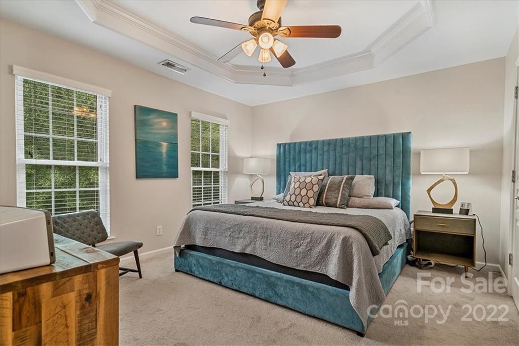 647 6th Baxter Crossing Fort Mill, SC 29708 - Photo 16 of 34 a bedroom with a bed and a window
