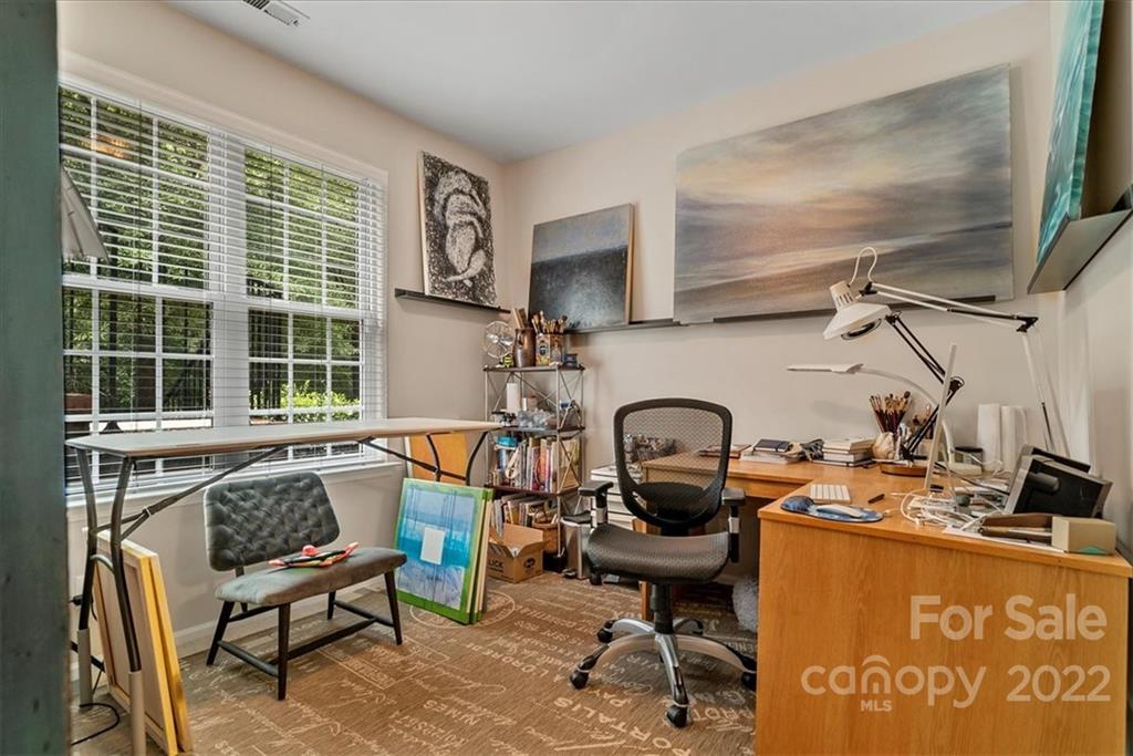 647 6th Baxter Crossing Fort Mill, SC 29708 - Photo 29 of 34 a work place with table and chairs