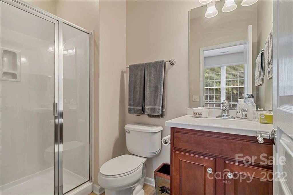 647 6th Baxter Crossing Fort Mill, SC 29708 - Photo 31 of 34 a bathroom with a toilet a sink and a bathtub