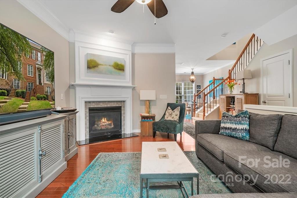 647 6th Baxter Crossing Fort Mill, SC 29708 - Photo 6 of 34 a living room with furniture and a fireplace