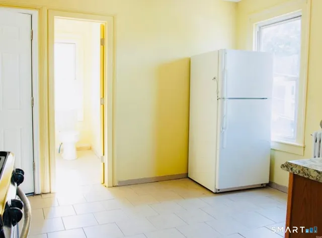 a view of walk in closet with window