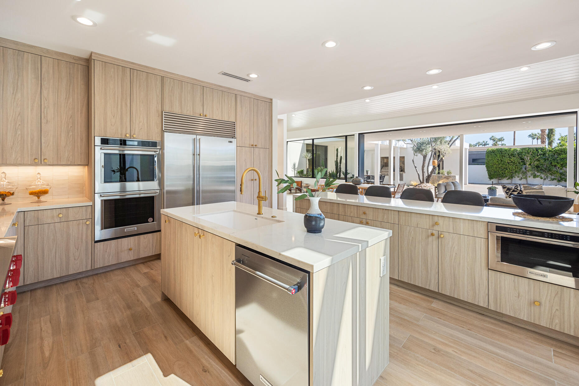 45560 Williams Road Indian Wells, CA 92210 - Photo 28 of 60 a kitchen with a sink stainless steel appliances and cabinets