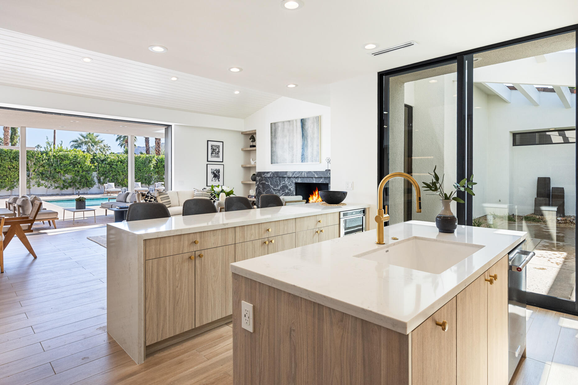 45560 Williams Road Indian Wells, CA 92210 - Photo 30 of 60 a kitchen with a sink a stove and cabinets