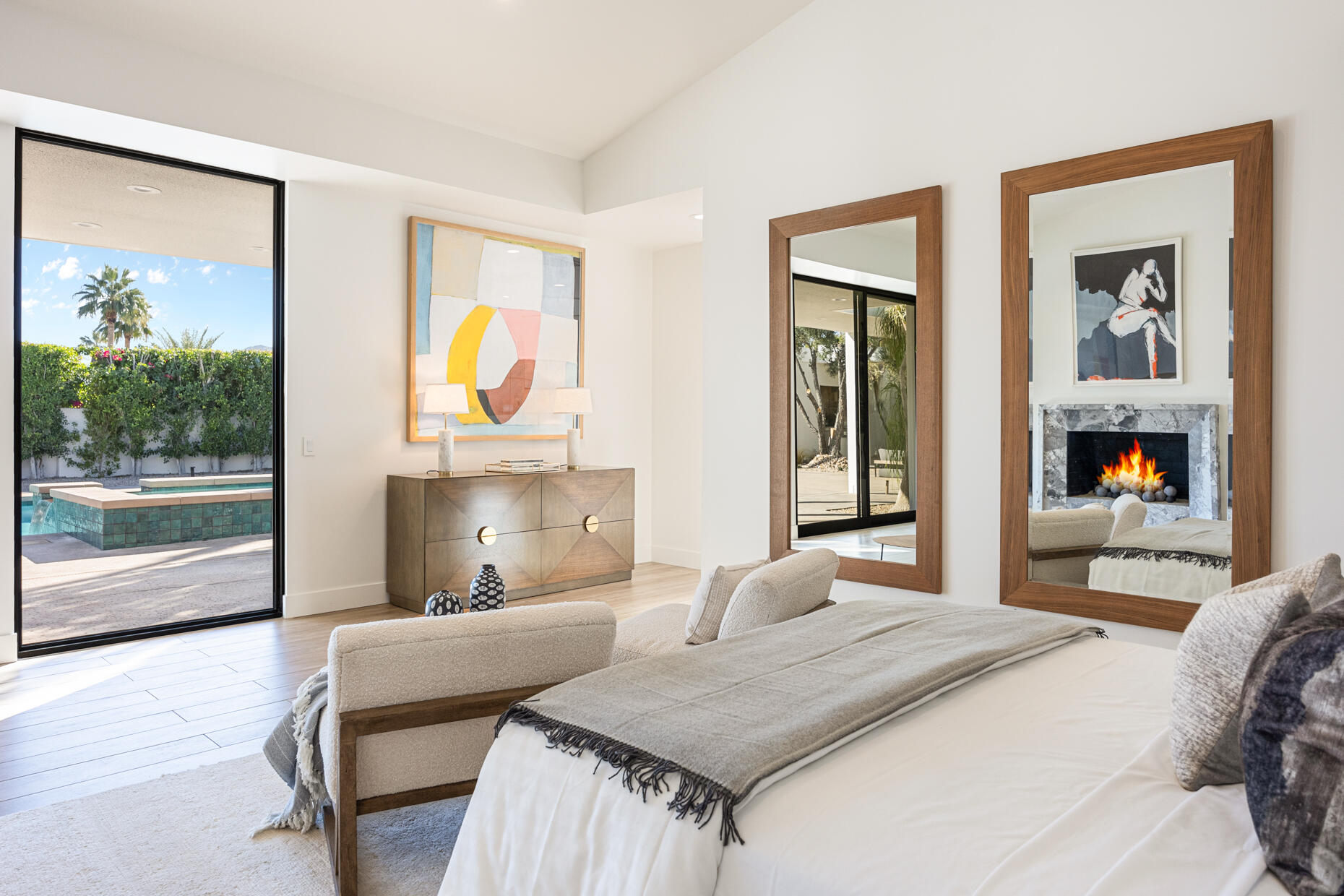 45560 Williams Road Indian Wells, CA 92210 - Photo 32 of 60 a bedroom with a bed and glass windows