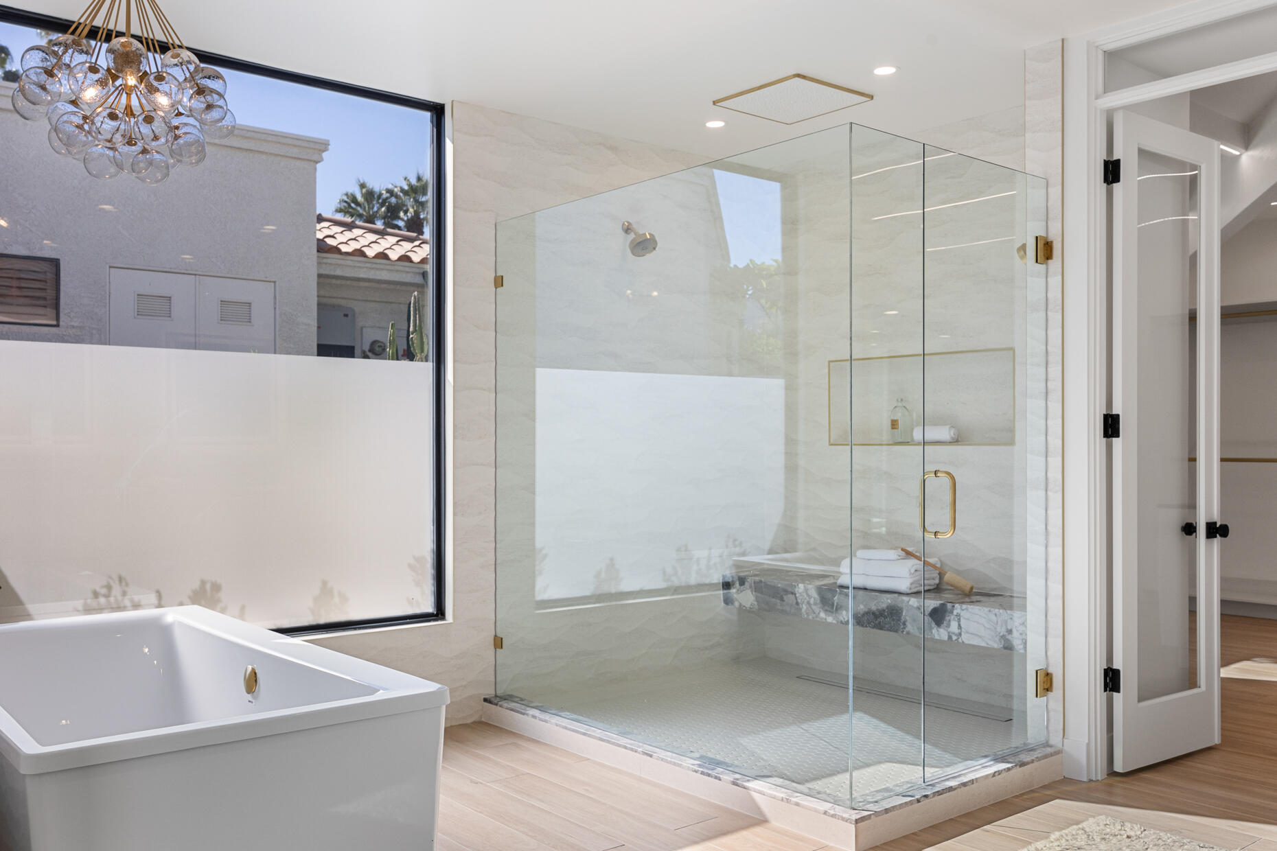 45560 Williams Road Indian Wells, CA 92210 - Photo 36 of 60 a bathroom with a tub a sink and a mirror