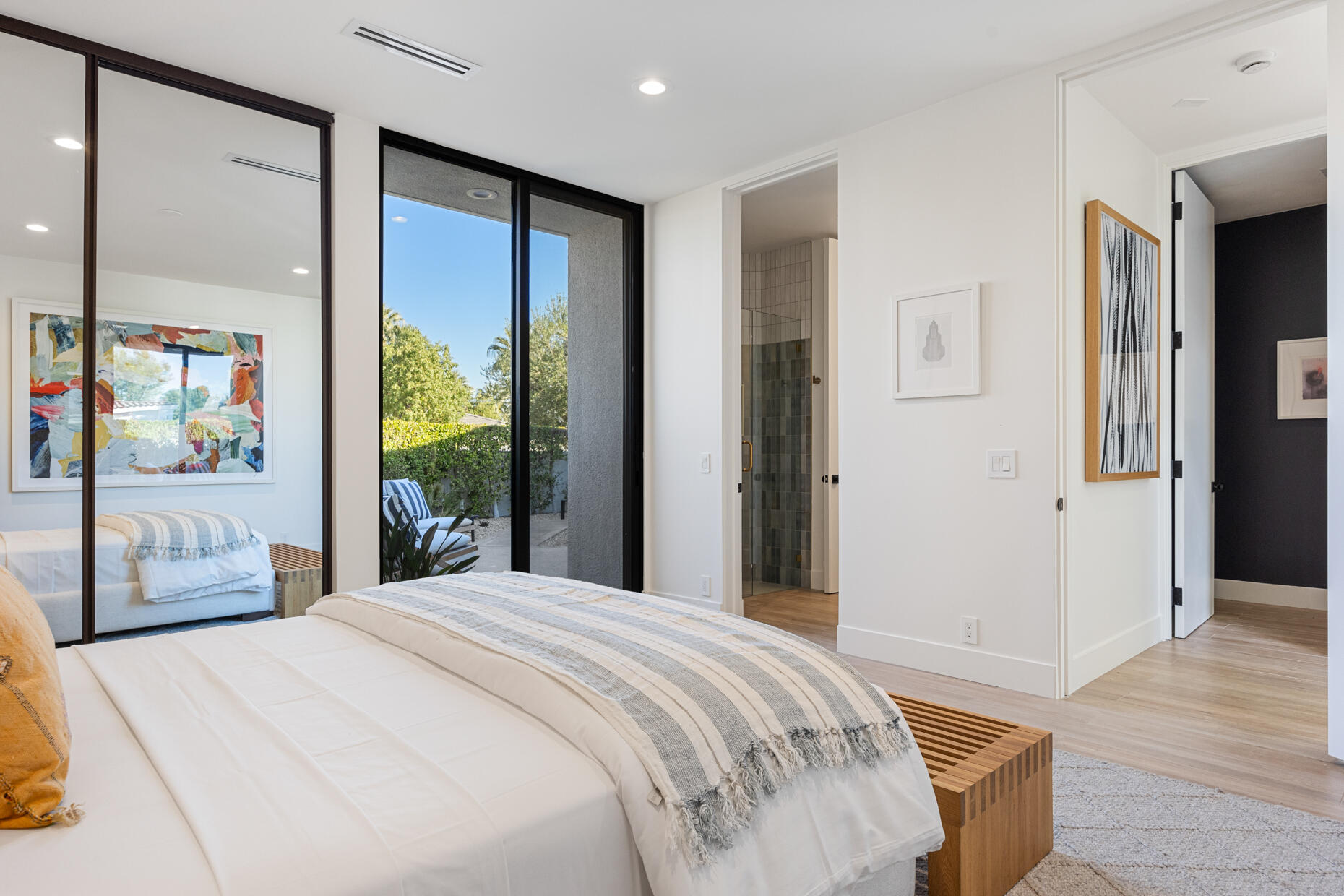 45560 Williams Road Indian Wells, CA 92210 - Photo 40 of 60 a bedroom with a large bed and a large window