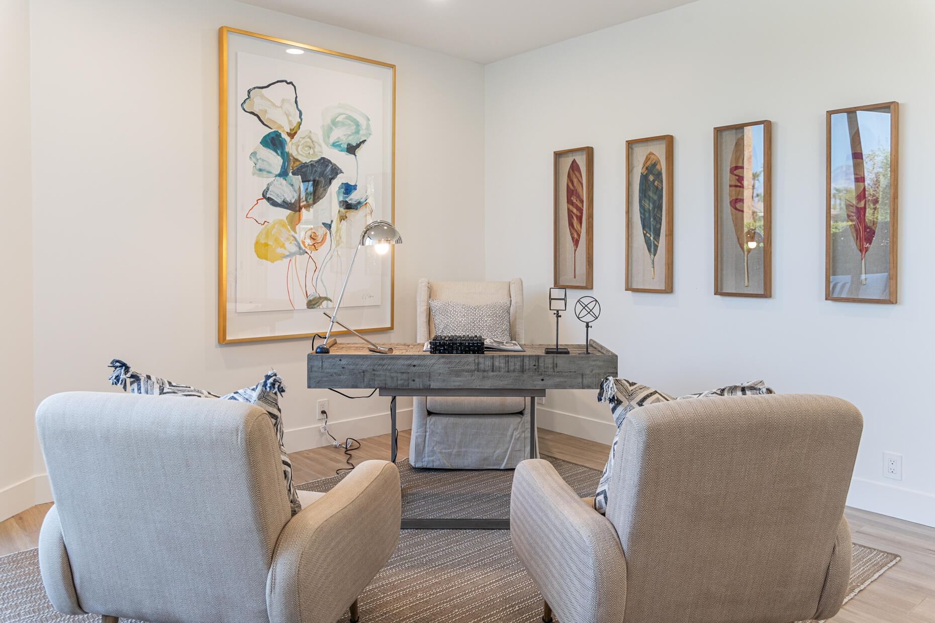 45560 Williams Road Indian Wells, CA 92210 - Photo 42 of 60 a living room with furniture and wall paintings