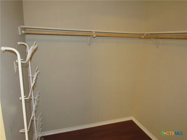 a view of small space with racks on the wall