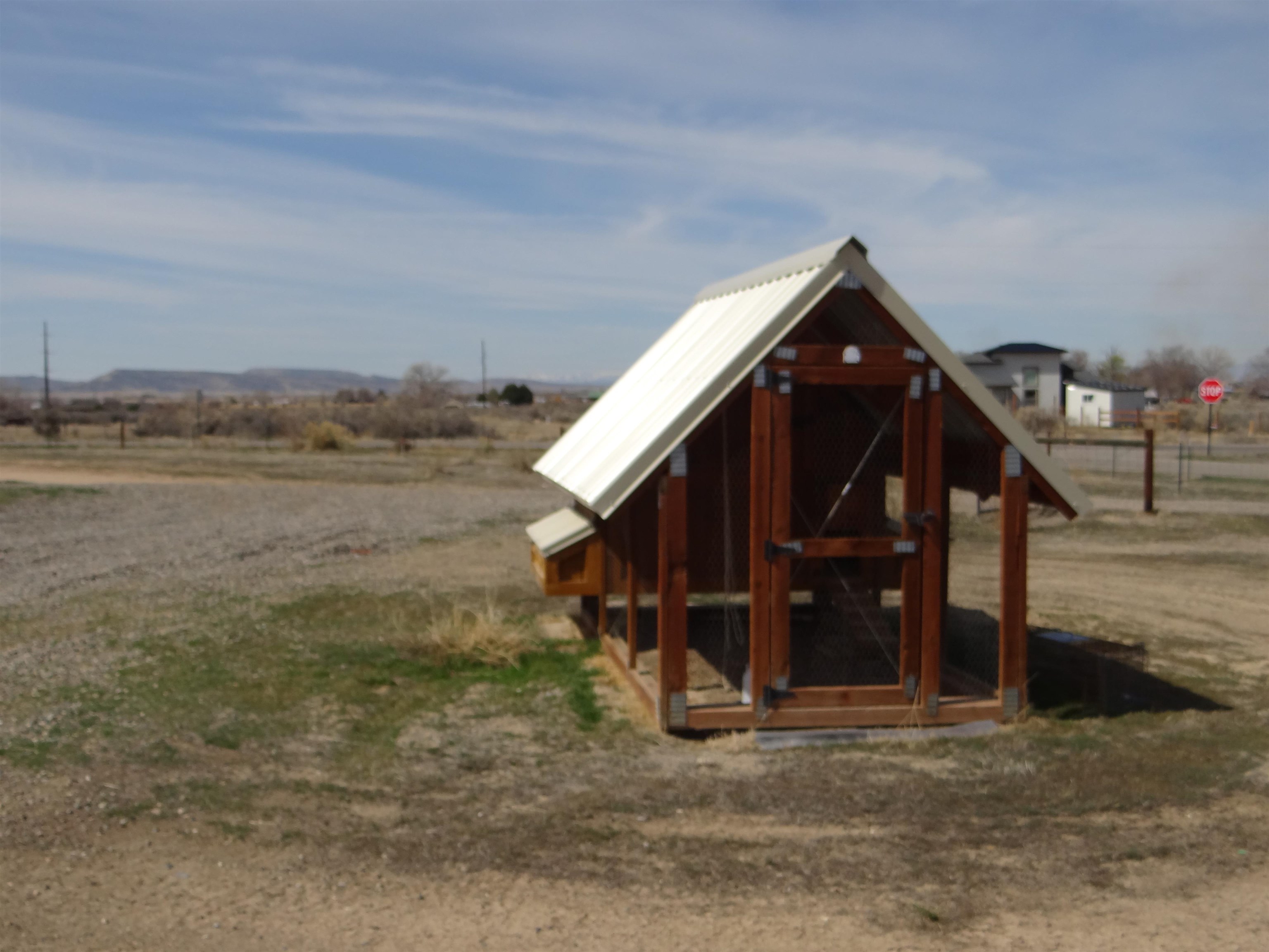 1719 P Road Loma, CO 81524 - Photo 8 of 12 a view of a house with a ocean view