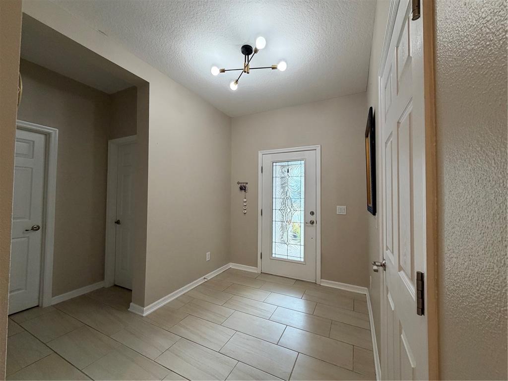 1834 Castleton Drive St. Cloud, FL 34771 - Photo 28 of 33 a view of an empty room with closet and a window