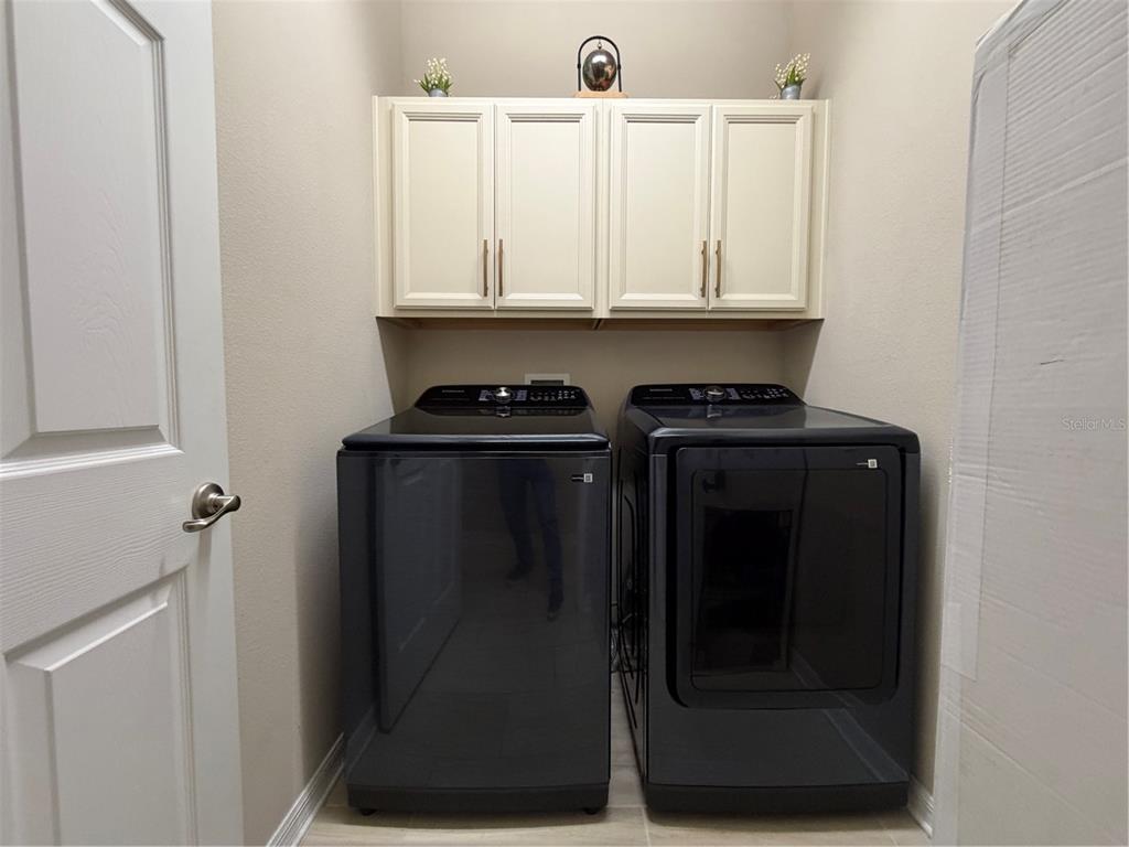 1834 Castleton Drive St. Cloud, FL 34771 - Photo 33 of 33 a close view of a utility room with sink and cabinets