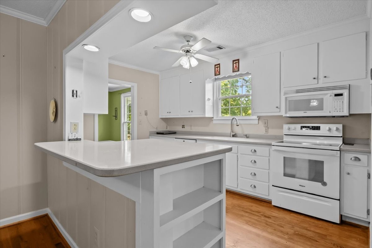 935 Evans Road Nashville, TN 37204 - Photo 13 of 44 a kitchen with cabinets a sink and appliances