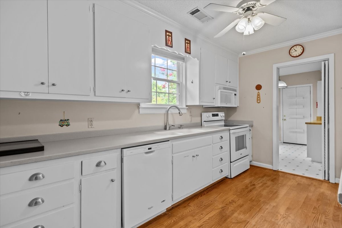 935 Evans Road Nashville, TN 37204 - Photo 14 of 44 a kitchen with cabinets appliances and a window