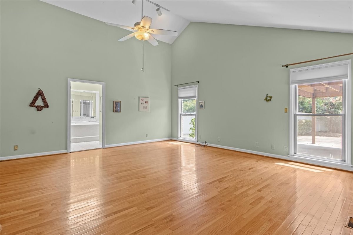 935 Evans Road Nashville, TN 37204 - Photo 23 of 44 a view of empty room with wooden floor and fan