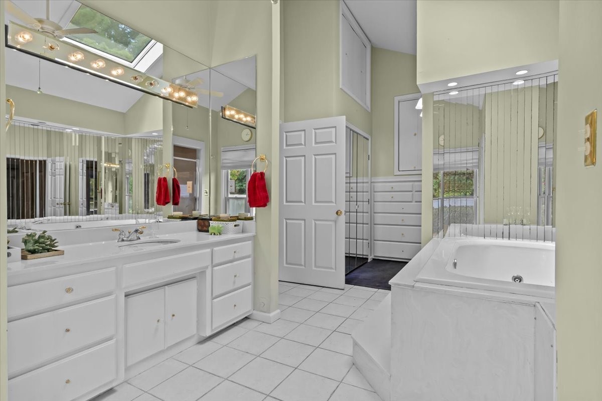 935 Evans Road Nashville, TN 37204 - Photo 24 of 44 a bathroom with a sink and a mirror