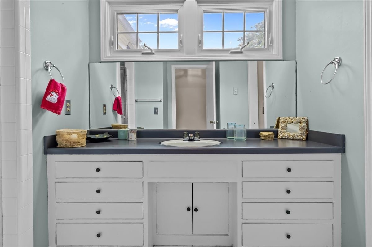 935 Evans Road Nashville, TN 37204 - Photo 30 of 44 a bathroom with a sink and a mirror