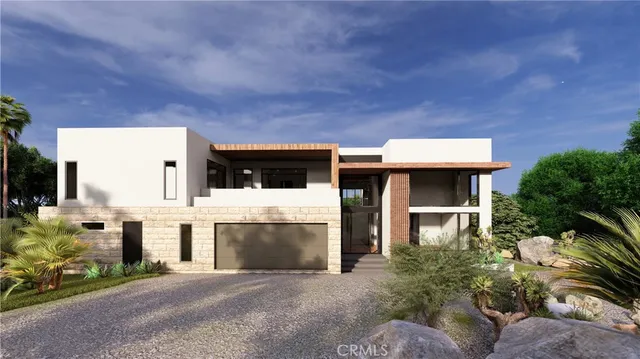 a front view of a house with a garage