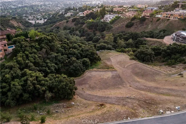 an aerial view of mountain with an outdoor space