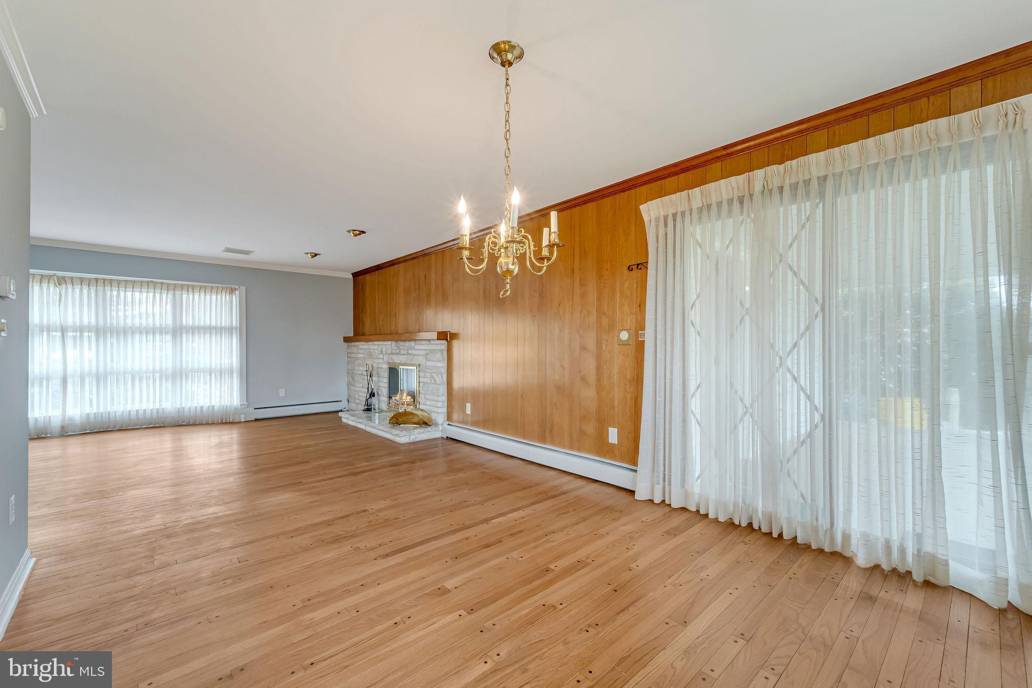2 Cedar Lane Pemberton, NJ 08068 - Photo 14 of 56 a view of empty room with wooden floor and fan