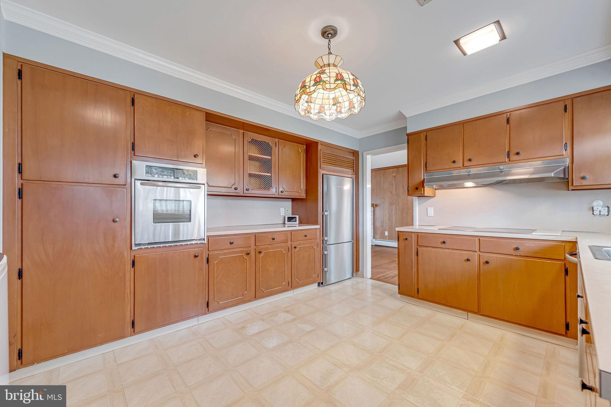2 Cedar Lane Pemberton, NJ 08068 - Photo 20 of 56 a kitchen with stainless steel appliances granite countertop a refrigerator sink and cabinets