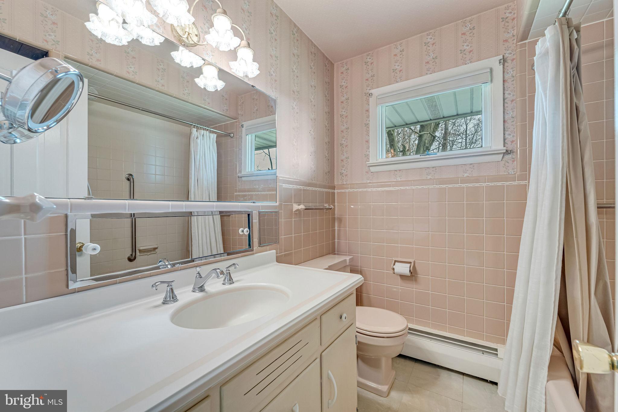 2 Cedar Lane Pemberton, NJ 08068 - Photo 27 of 56 a bathroom with a sink a toilet and a mirror