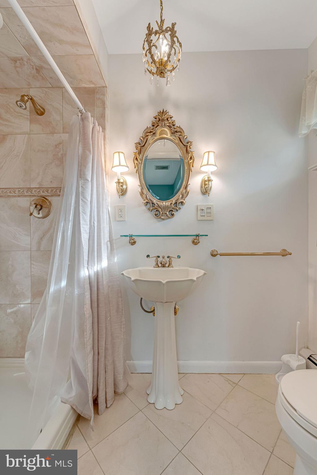 2 Cedar Lane Pemberton, NJ 08068 - Photo 28 of 56 a bathroom with a sink a toilet and a mirror