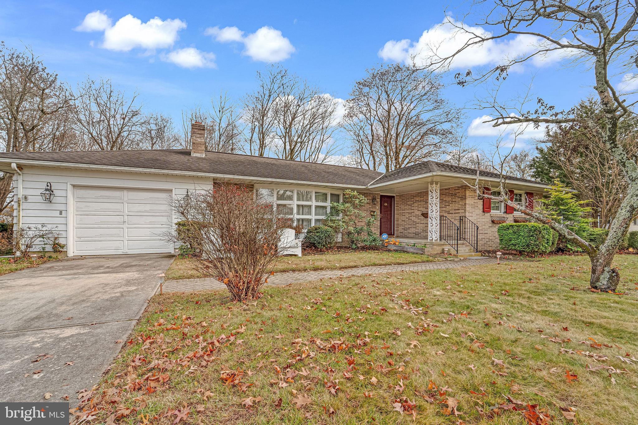 2 Cedar Lane Pemberton, NJ 08068 - Photo 4 of 56 a front view of a house with garden