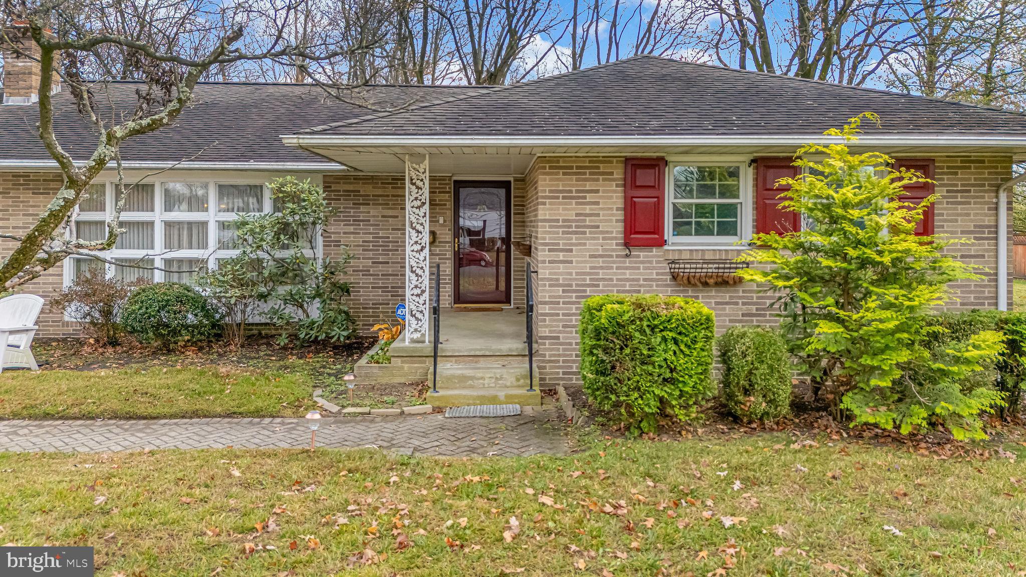 2 Cedar Lane Pemberton, NJ 08068 - Photo 7 of 56 a front view of a house with garden