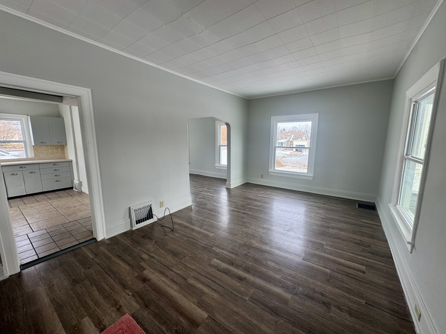 312 East Division Street Kewanee, IL 61443 - Photo 5 of 11 a view of empty room with window and wooden floor