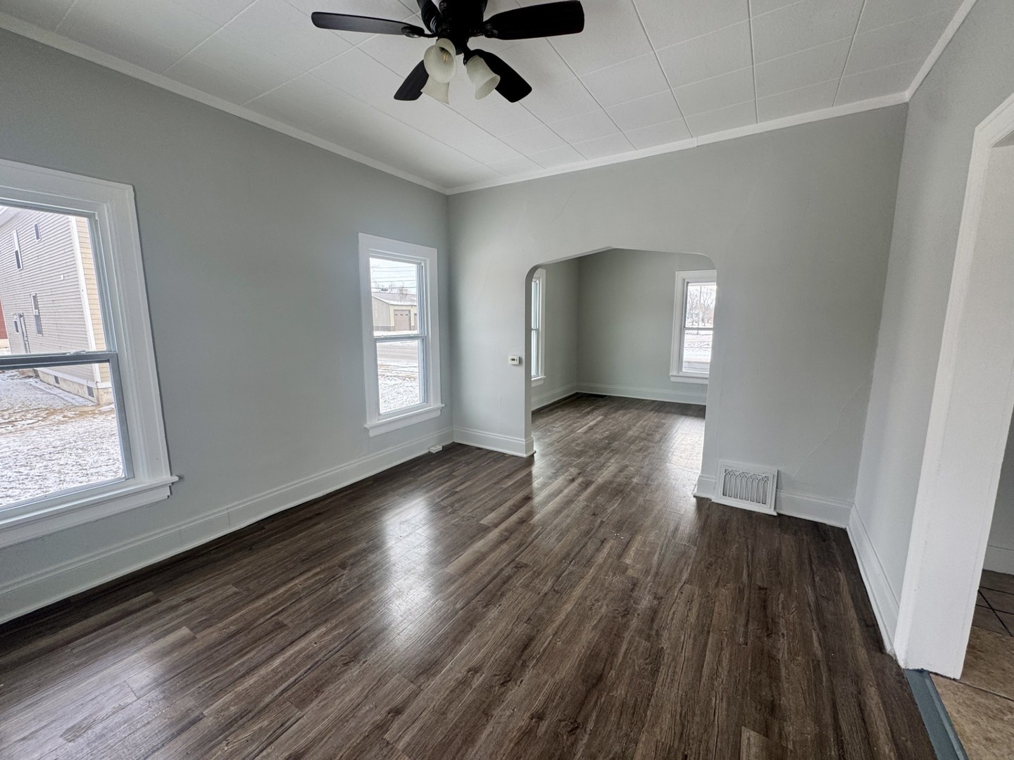 312 East Division Street Kewanee, IL 61443 - Photo 6 of 11 wooden floor in an empty room with a window