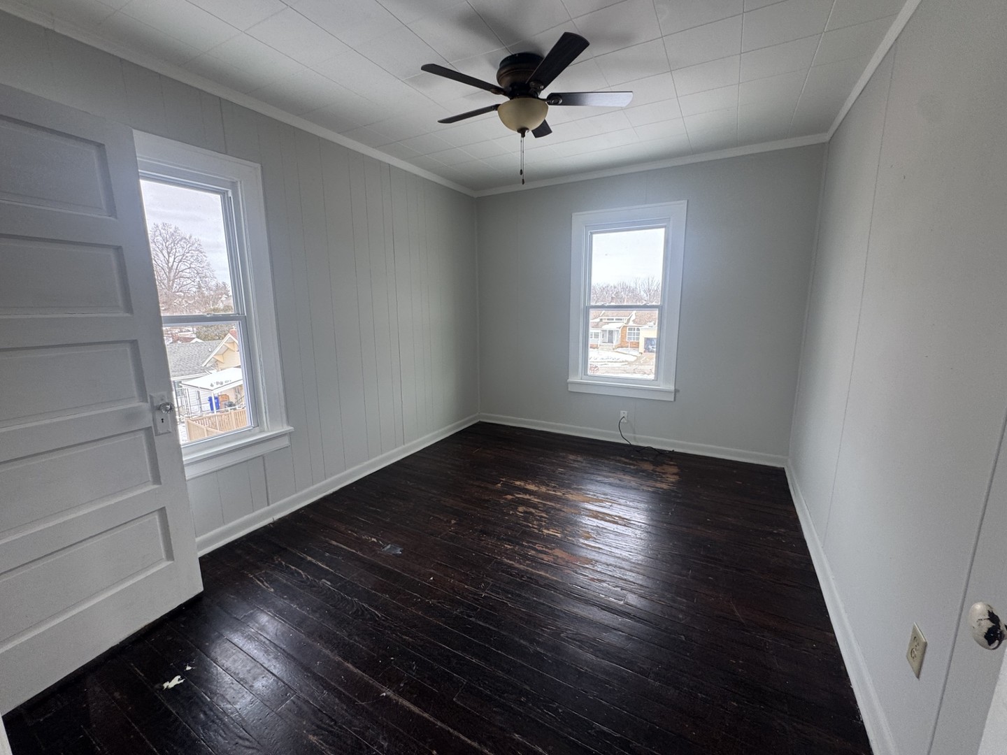 312 East Division Street Kewanee, IL 61443 - Photo 10 of 11 a view of empty room with wooden floor and fan
