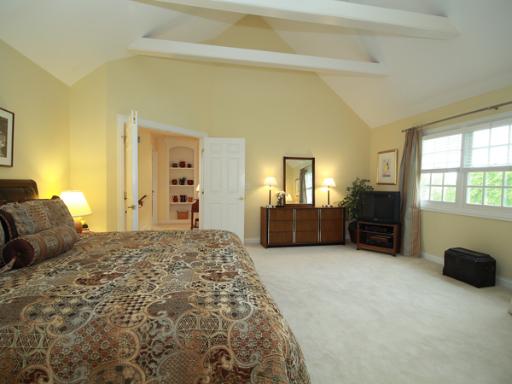 7N050 Ridge Line Road St. Charles, IL 60175 - Photo 4 of 16 a large bedroom with a bed and a couch