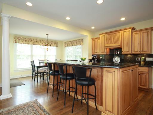 7N050 Ridge Line Road St. Charles, IL 60175 - Photo 8 of 16 a view of kitchen with granite countertop cabinets table and chairs