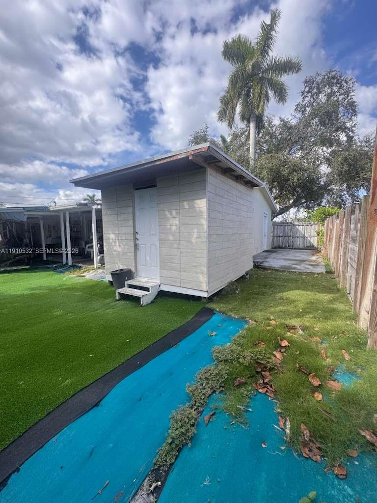 14800 Southwest 296th Street Homestead, FL 33033 - Photo 19 of 28 a view of a backyard with a garden