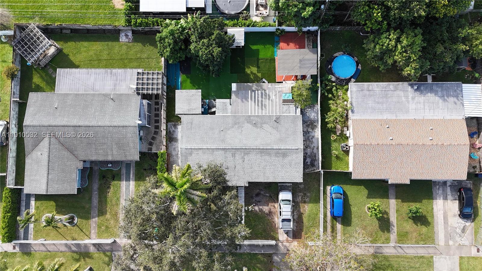 14800 Southwest 296th Street Homestead, FL 33033 - Photo 2 of 28 an aerial view of a house with a garden and plants