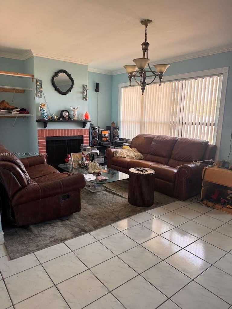 14800 Southwest 296th Street Homestead, FL 33033 - Photo 23 of 28 a living room with furniture and a window